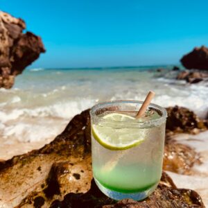 My cold drink on the beach.