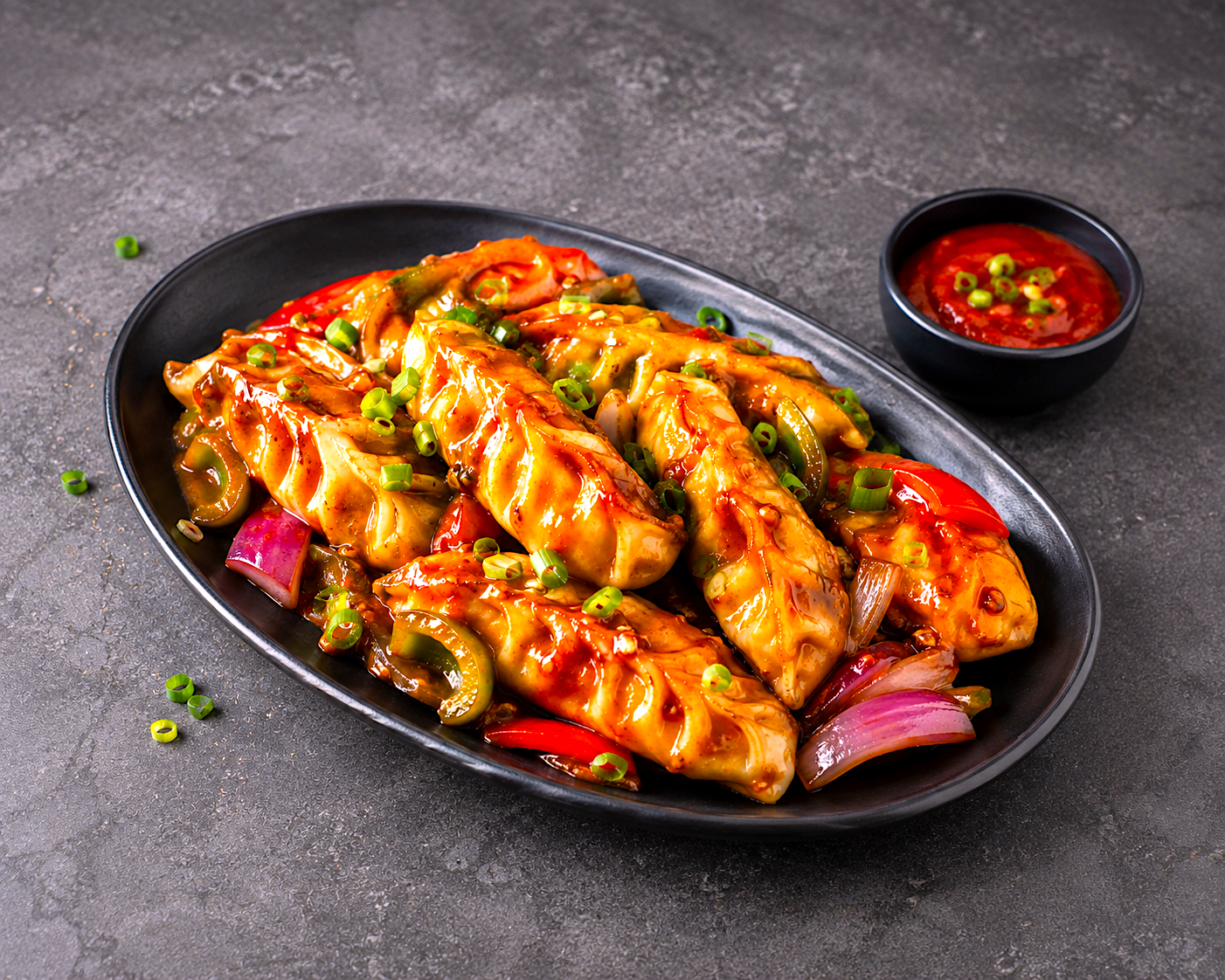 Paneer Chilli Momos (Full) - Image 1